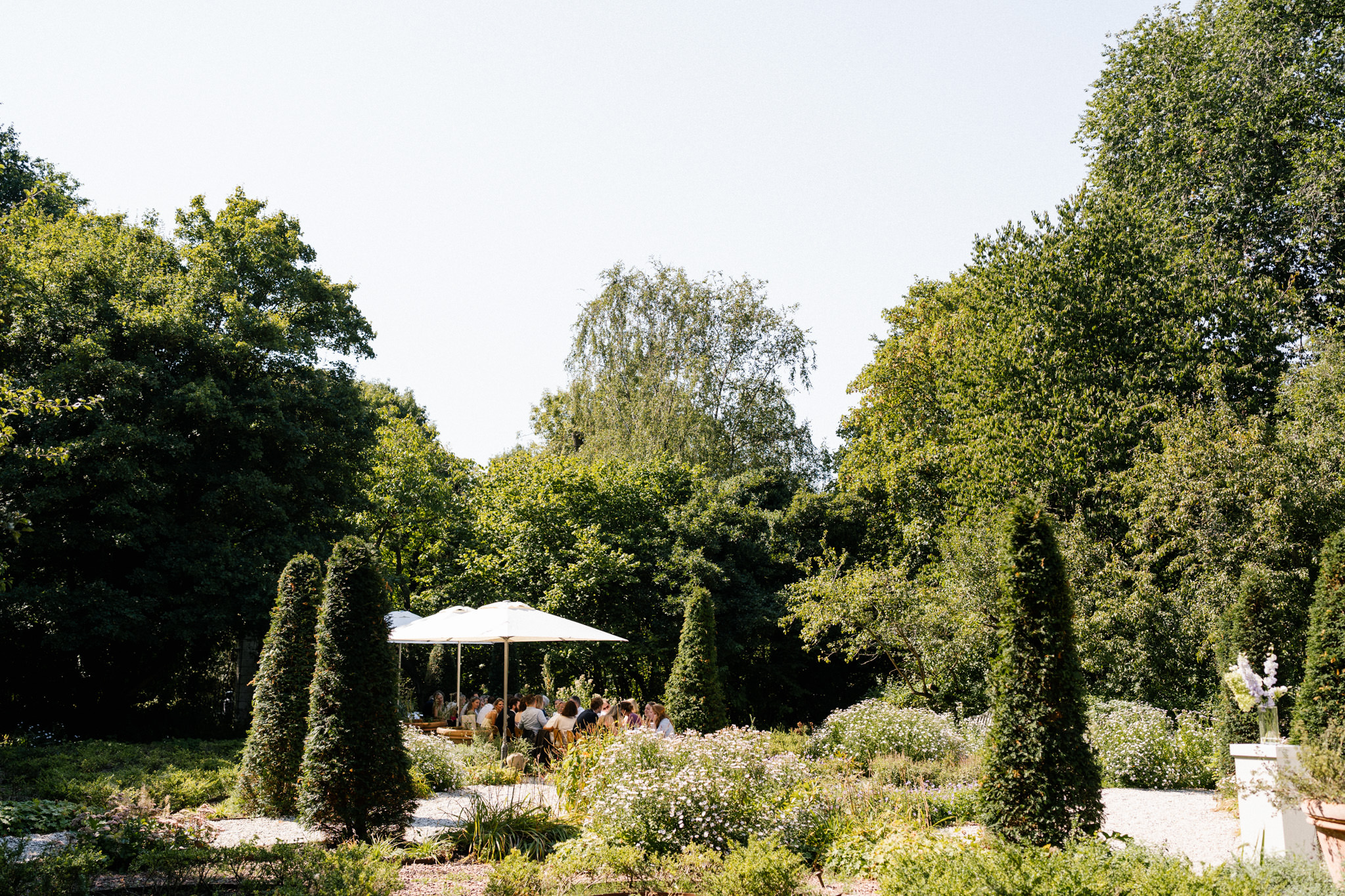 Long table setup for garden lunch at Huize Frankendael