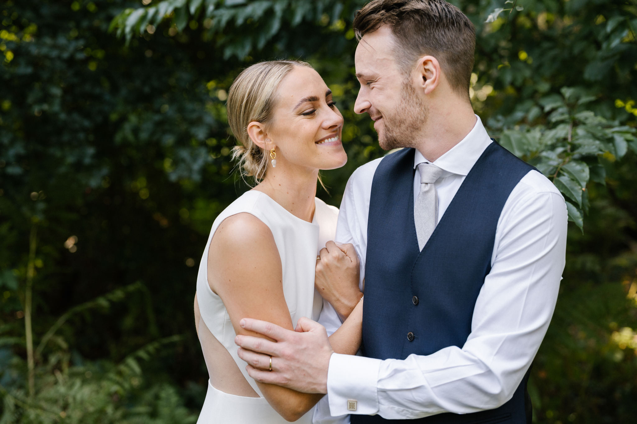 Bride and groom portraits in the garden at Huize Frankendael