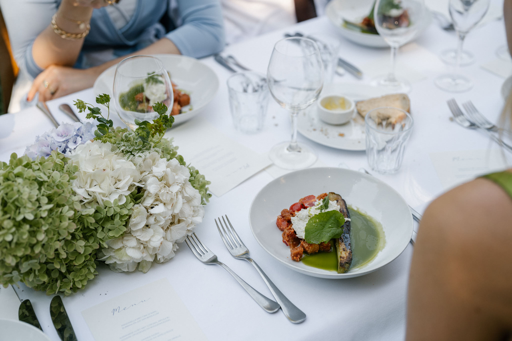 Long table setup for garden lunch at Huize Frankendael